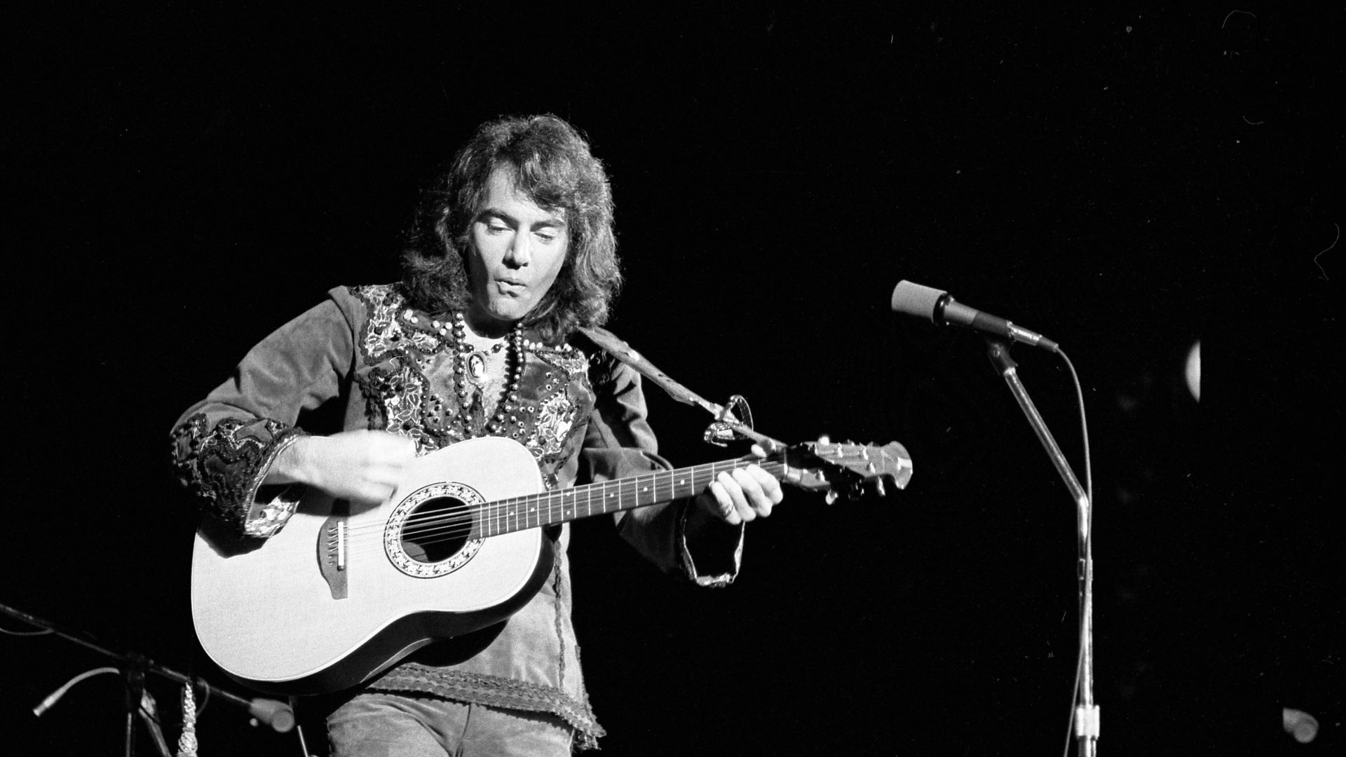 Neil Diamond on stage at the Greek Theater in Los Angeles
