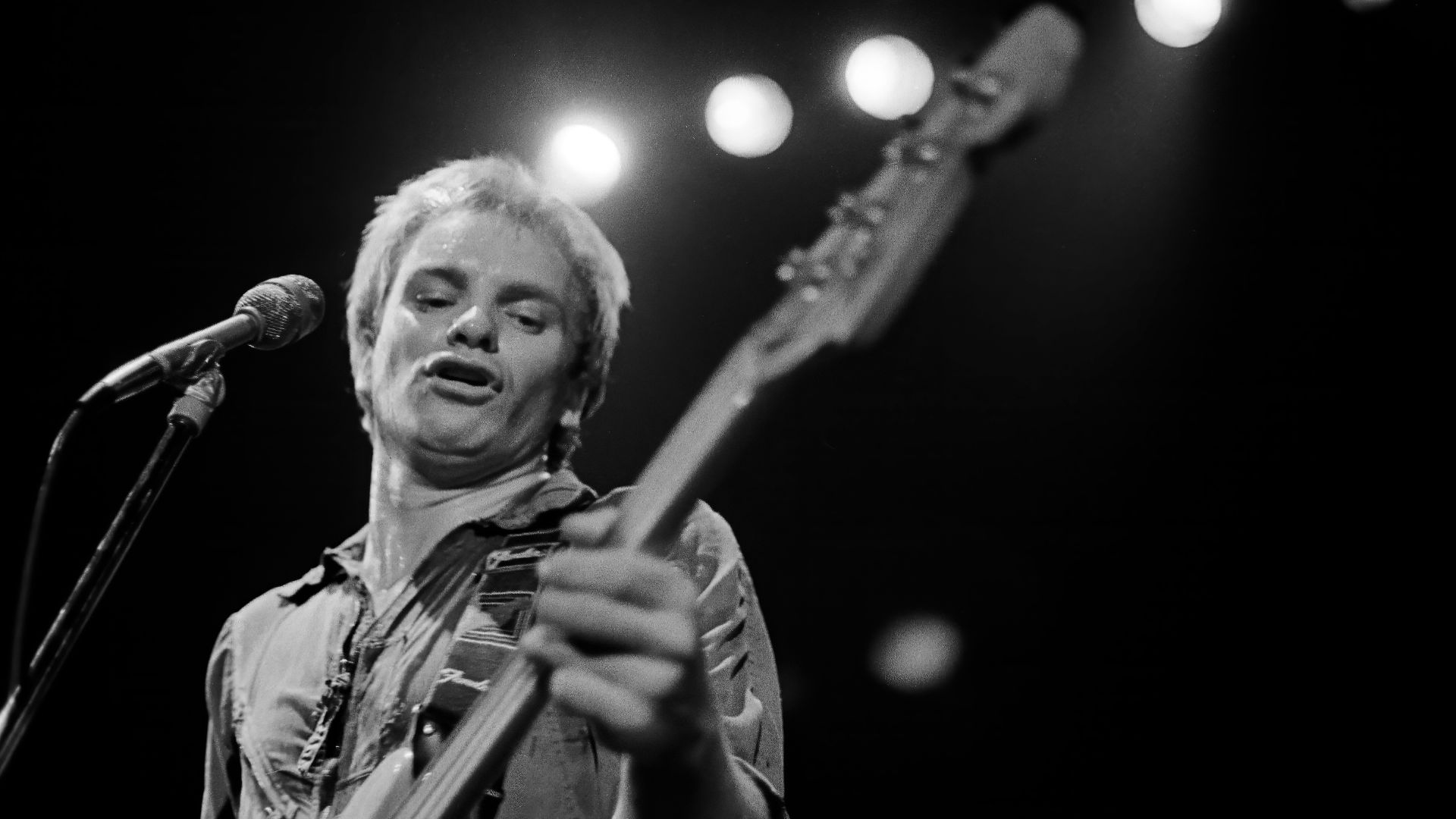 Sting at the Police concert at the Agora Ballroom, Atlanta, Georgia in 1979. Duplicated black and white negative.