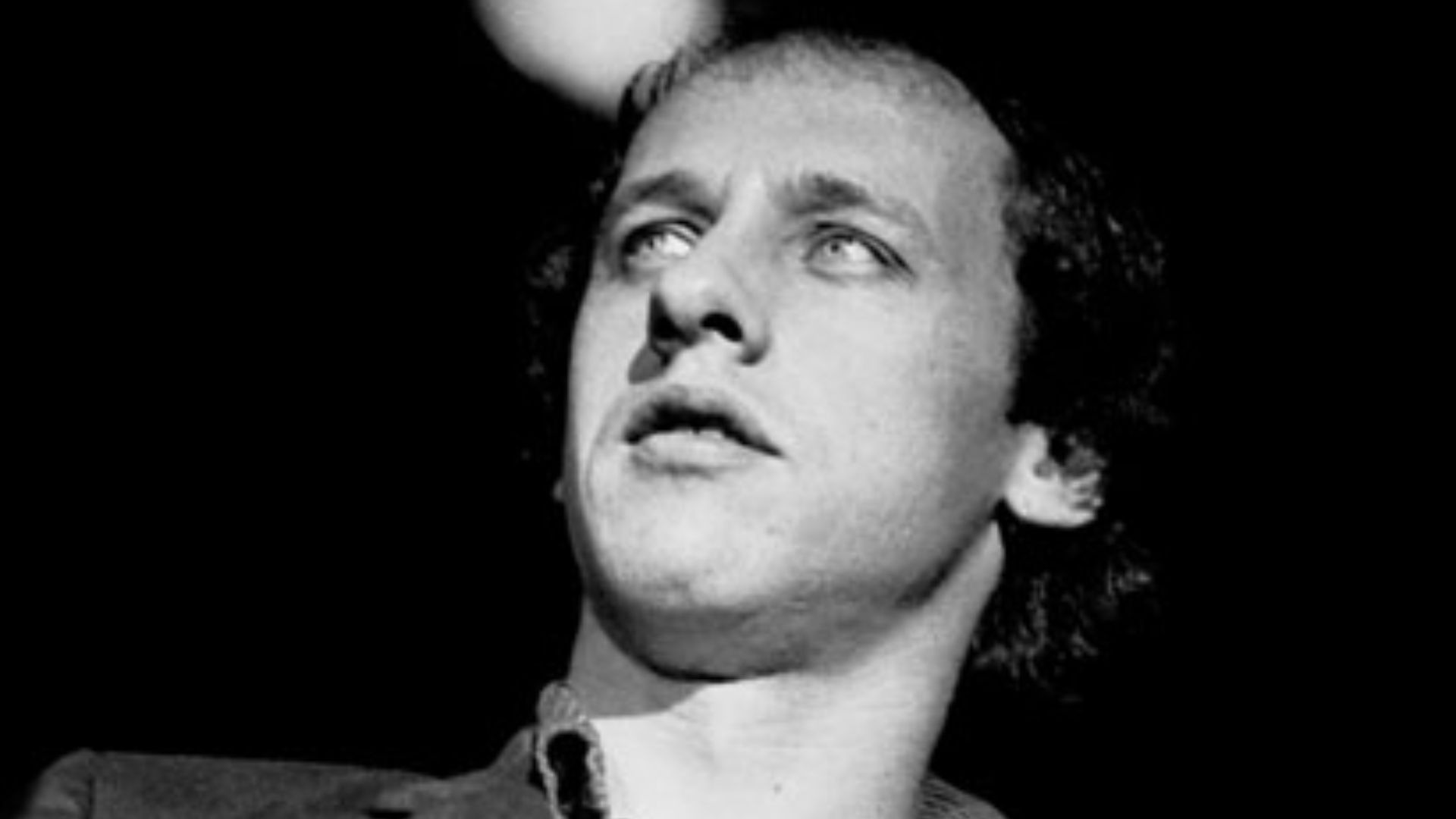 Mark Knopfler in concert performing with Dire Straits, National Stadium Dublin 1st January 1981. Photographer: Eddie Mallin