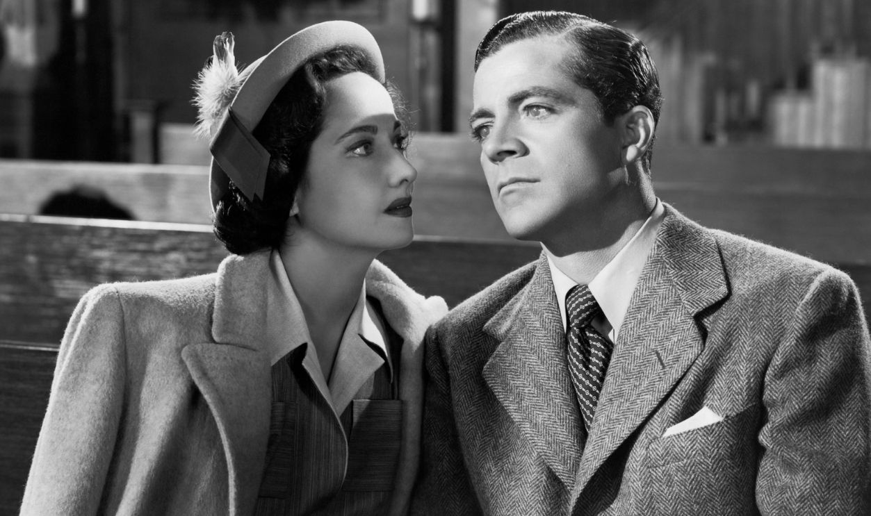 Publicity portrait of British actor Merle Oberon (1911-1979) (as 'Cathy') and American actor Dana Andrews (1909-1992) (as 'Dan') in the film 'Night Song', 1947, United States