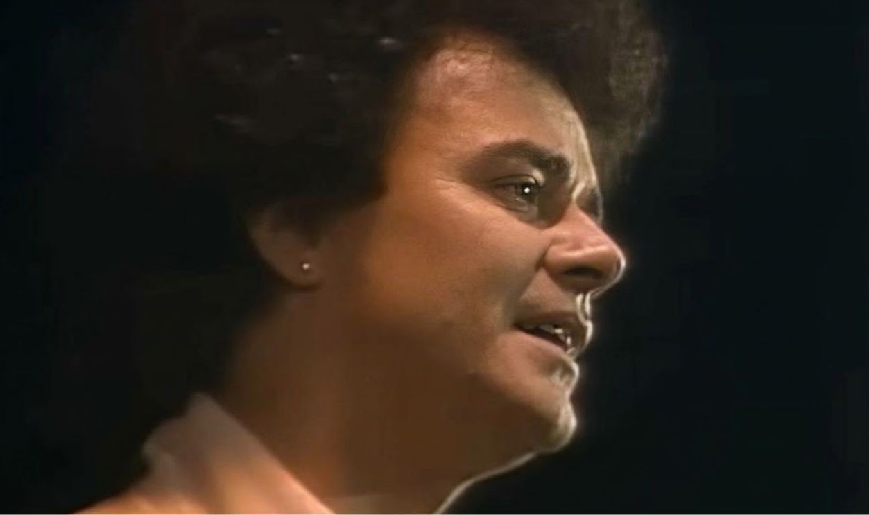 Screenshot from The One That You Love, Arista Records (1981)