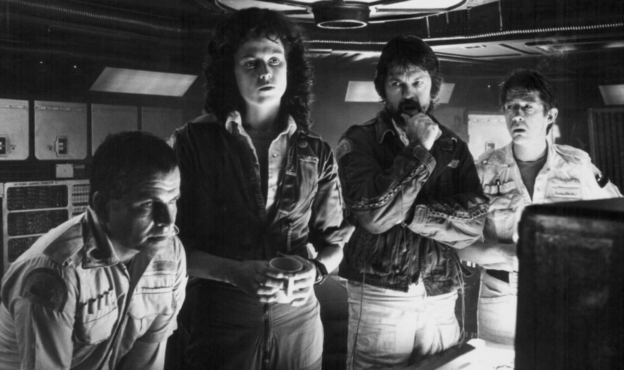Actors Ian Holm, Sigourney Weaver, Tom Skerritt and John Hurt, in a scene from the movie 'Alien', 1979. 