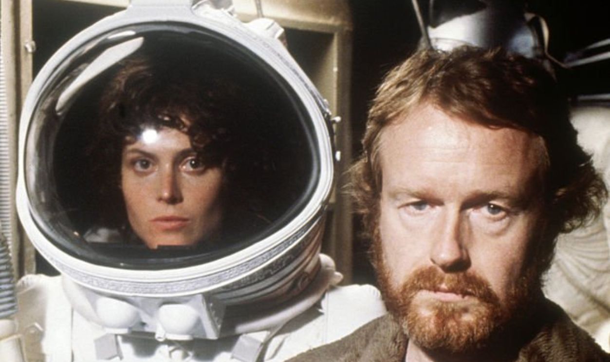American actress Sigourney Weaver with director Ridley Scott on the set of his movie Alien.