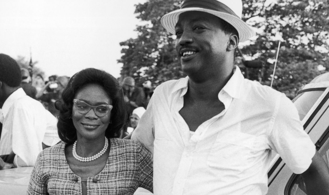 Getty Images - 3244168 - Actors Cicely Tyson and Paul Winfield, wearing period costumes, smile while leaning against a car in a promotional portrait for the TV miniseries 'King'. Tyson plays Coretta Scott King to Winfield's Martin Luther King, Jr.