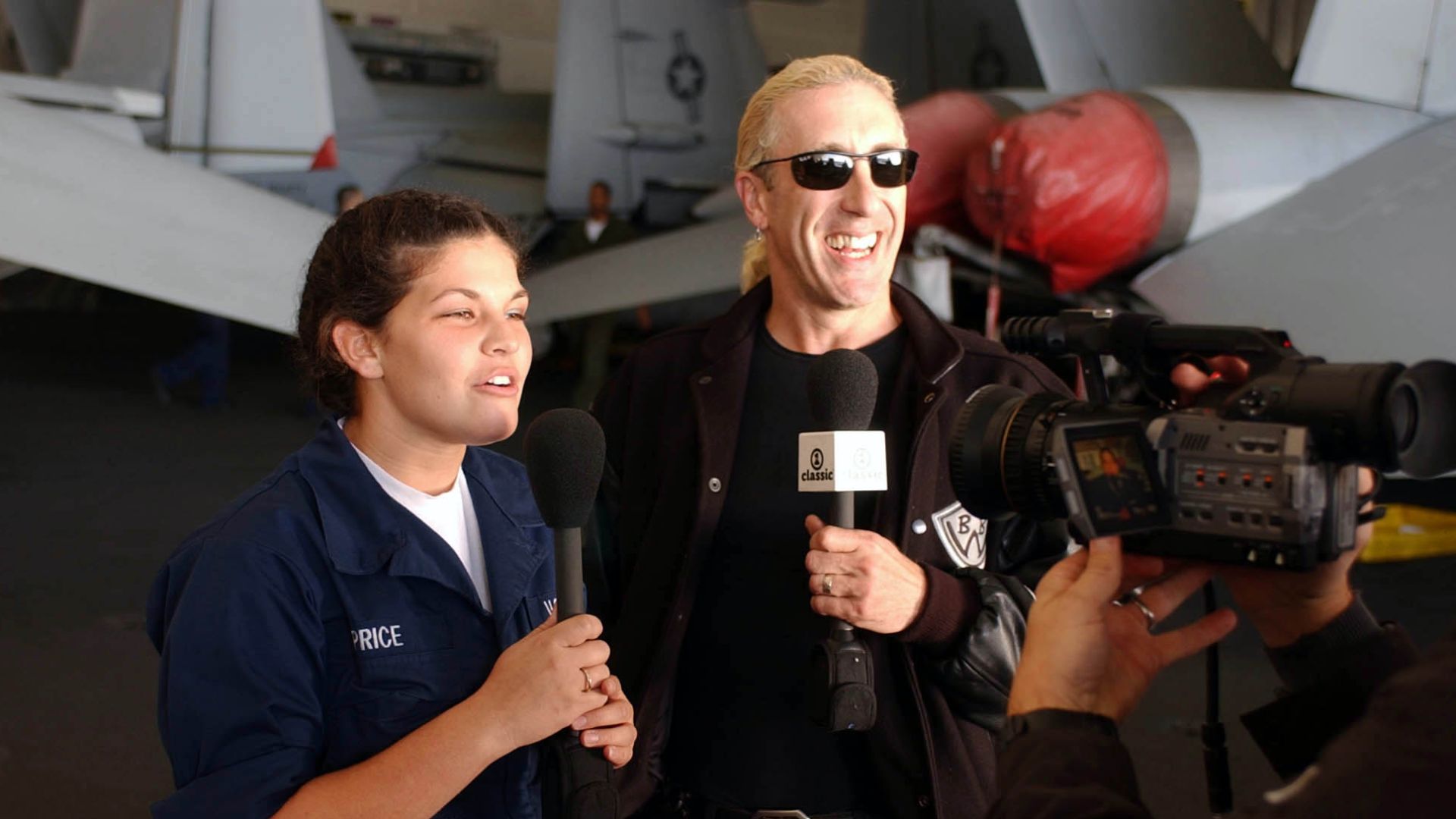 Dee Snider; 041104-N-8158F-062 Pacific Ocean (Nov. 4, 2004) – The rock band Twisted Sister’s front man, Dee Snider, receives a video request from Seaman Kellie Price, of Akron, Ohio, during a visit aboard the aircraft carrier USS Nimitz (CVN 68). Nimitz i