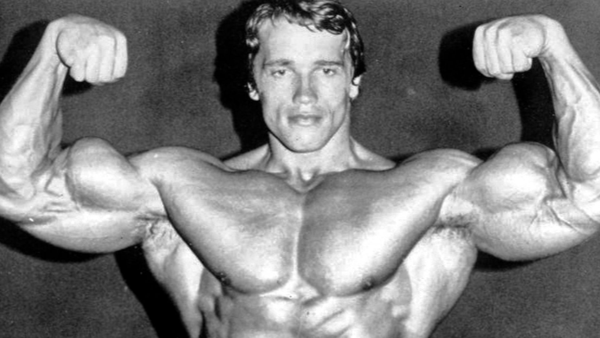 Photo of Arnold Schwarzenegger before defending the title for his fifth Mr. Olympia contest in 1974.