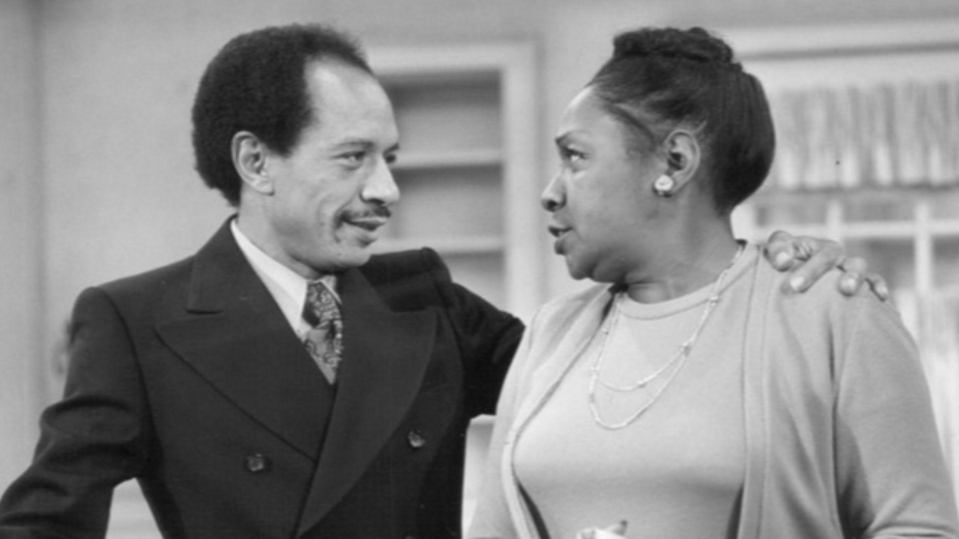 Publicity photo from  All in the Family. Pictured are Sherman Helmsley (George Jefferson) and Isabel Sanford (Louise Jefferson) as they pack to move from Queens to Manhattan. This began the television series The Jeffersons.