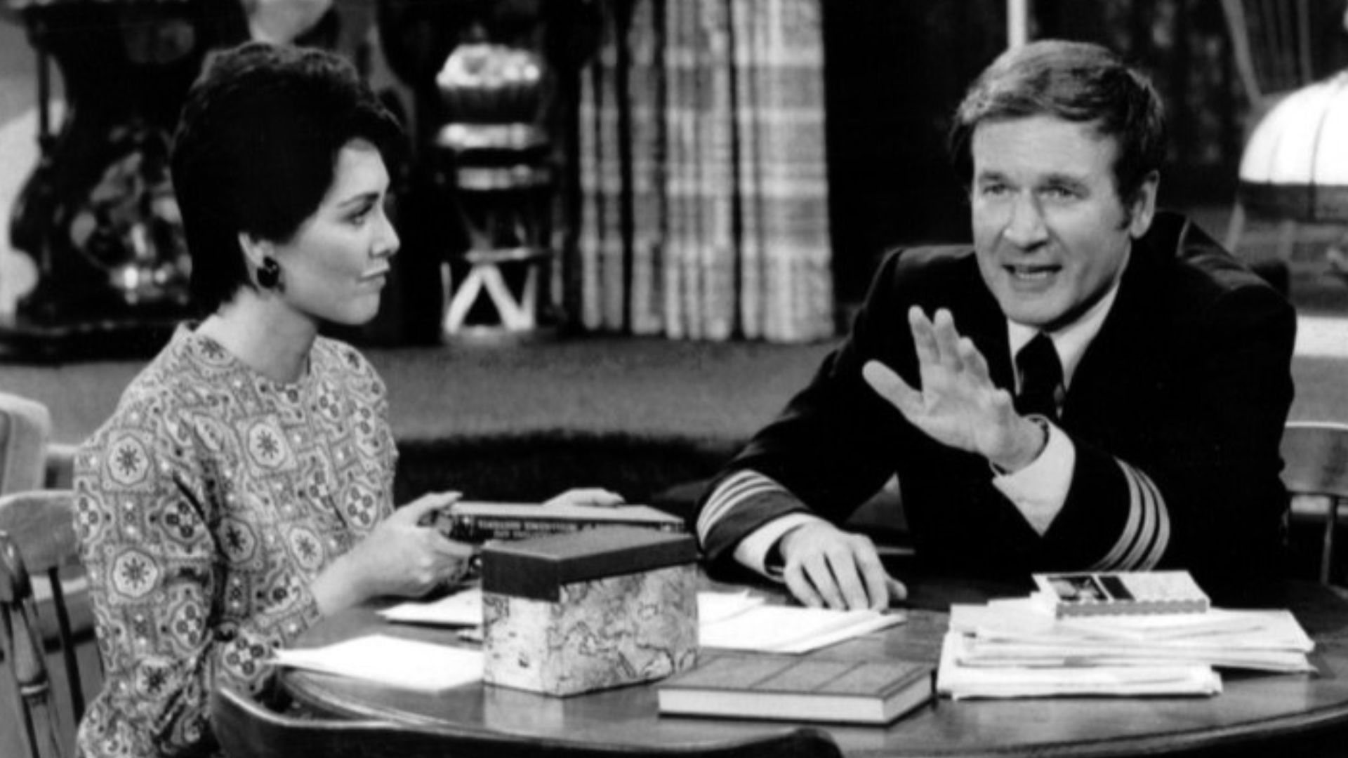 Photo from the television program The Bob Newhart Show.  Emily (Suzanne Pleshette) listens to Howard (Bill Daily).