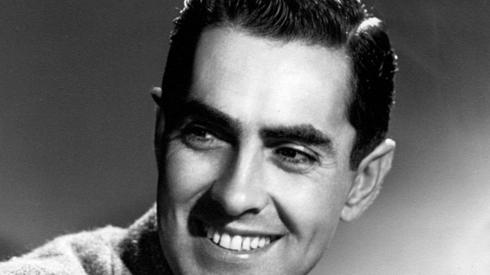 Publicity photo of Tyrone Power.