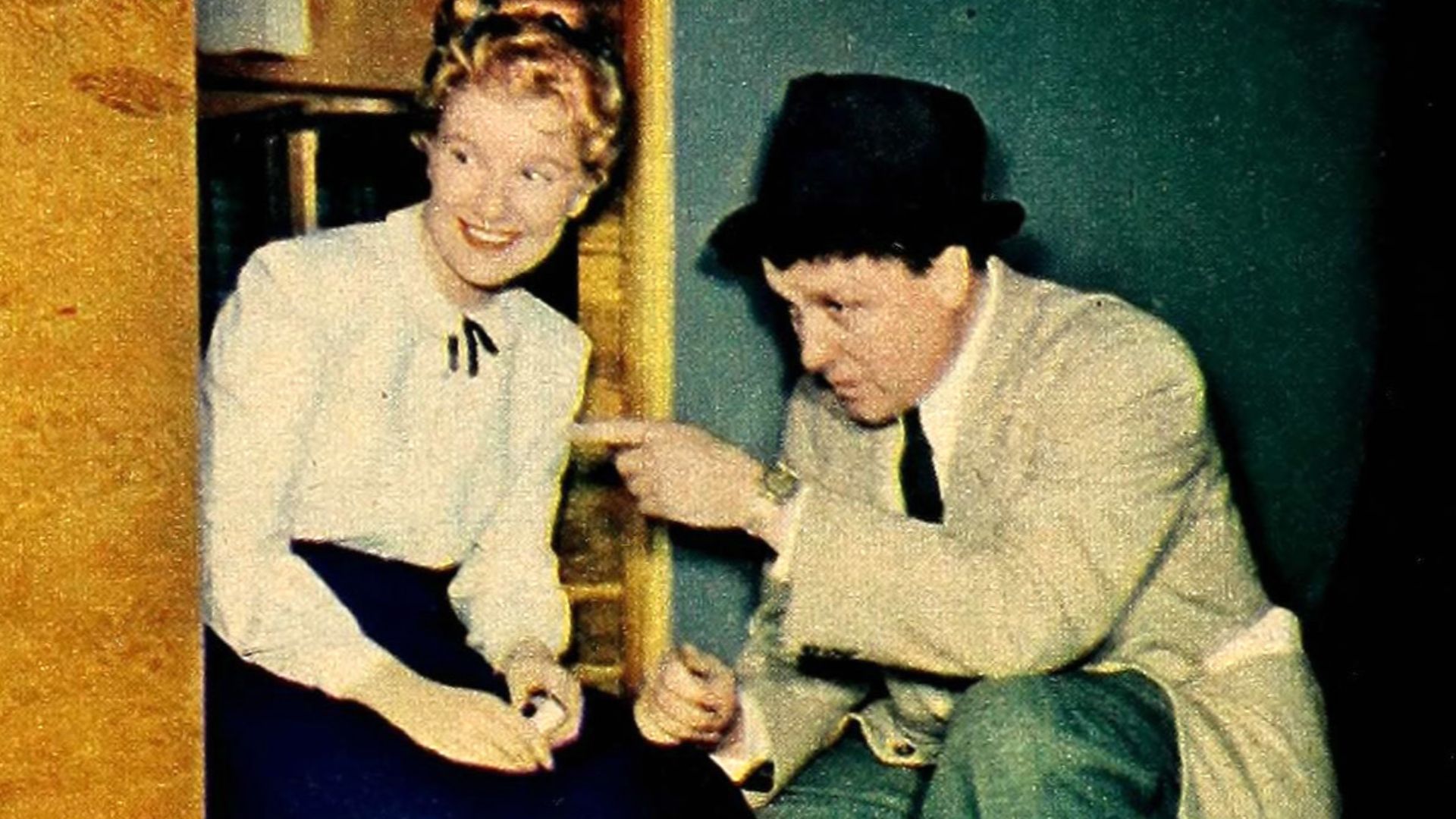 Photo of George Stevens joking with Barbara Bel Geddes on the set of I Remember Mama.