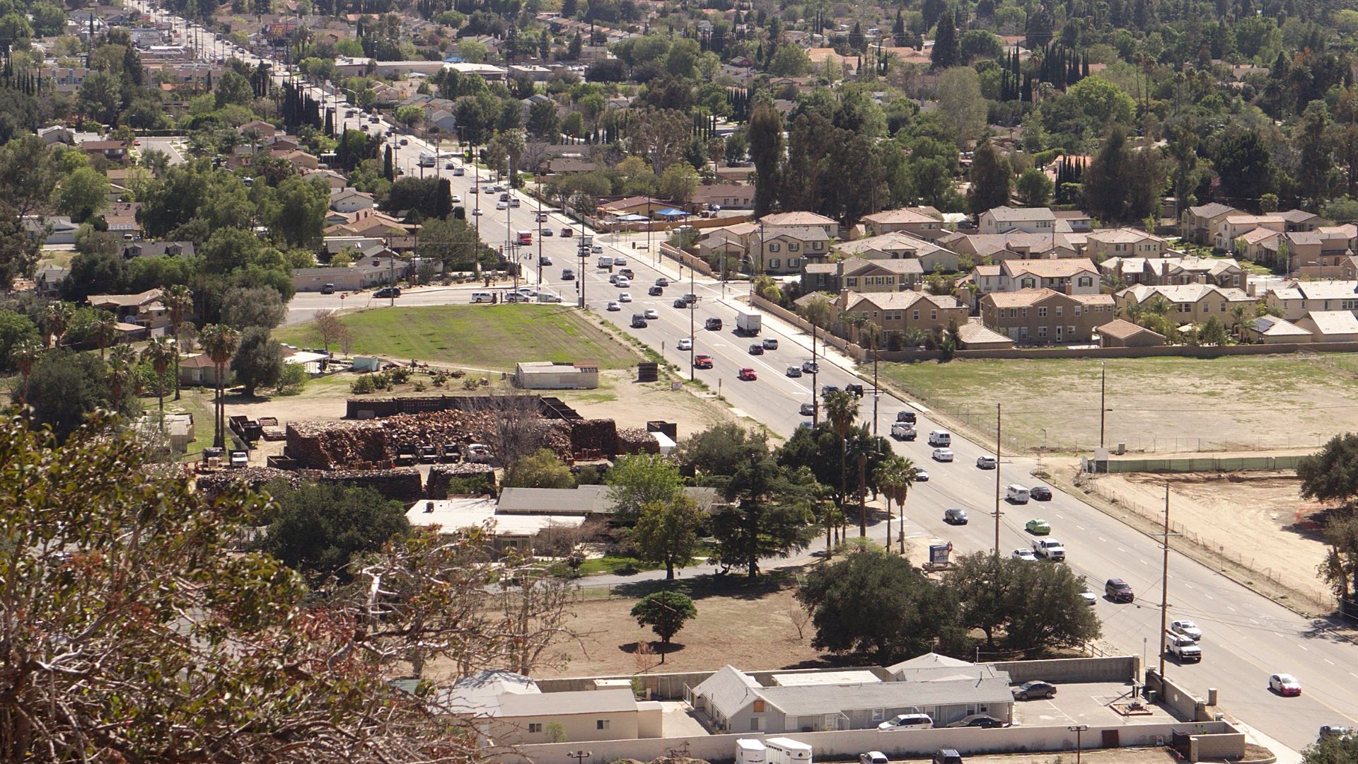 The northern end of California State Route 27, locally known as Topanga Canyon Boulevard, looking south towards the Santa Monica Mountains across the Chatsworth neighborhood of Los Angeles in the western San Fernando Valley. 
View is from Stoney Point, ne