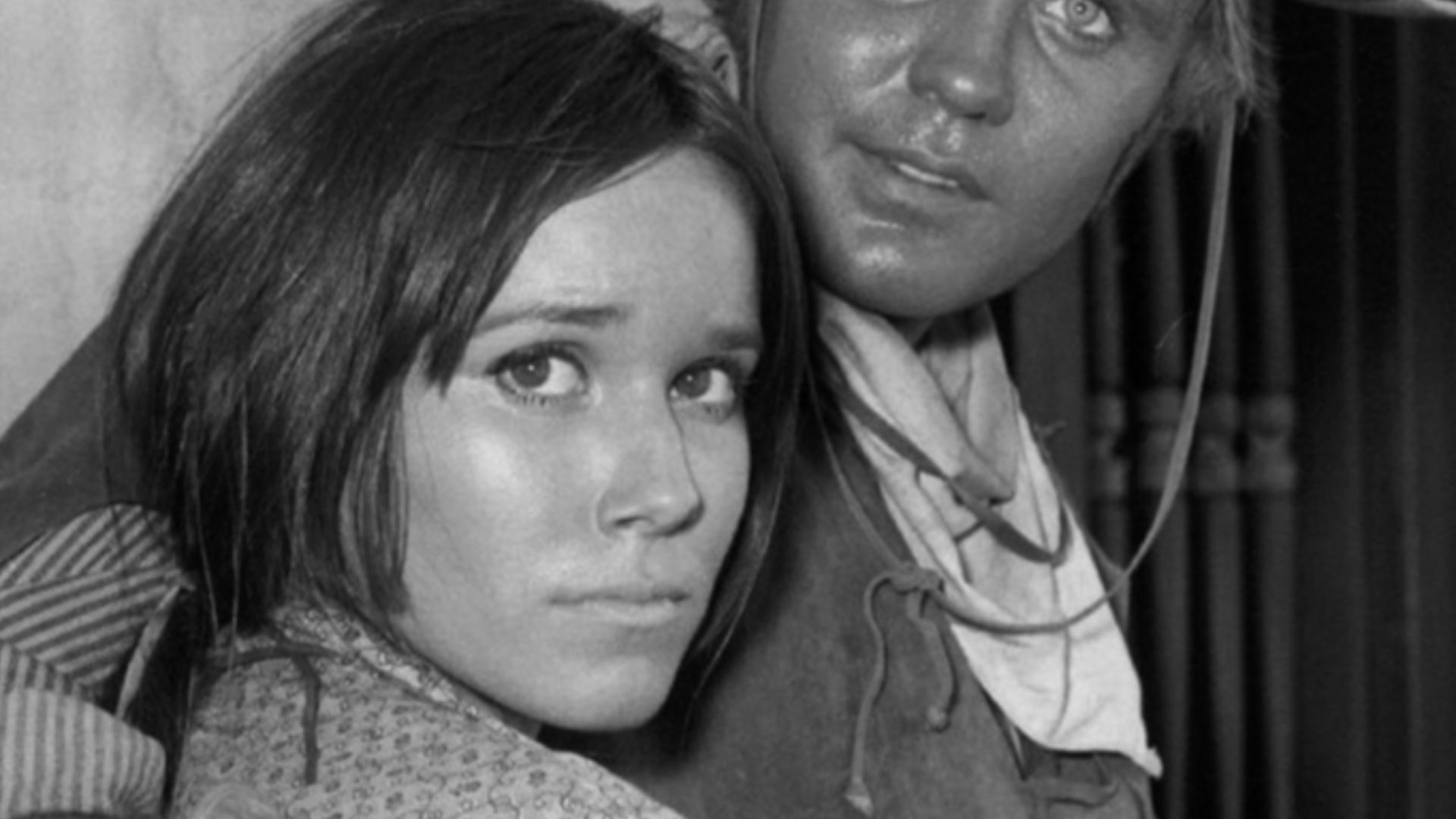 Photo of Mark Slade as Billy Blue Cannon and guest star Barbara Hershey in the television program The High Chaparral.