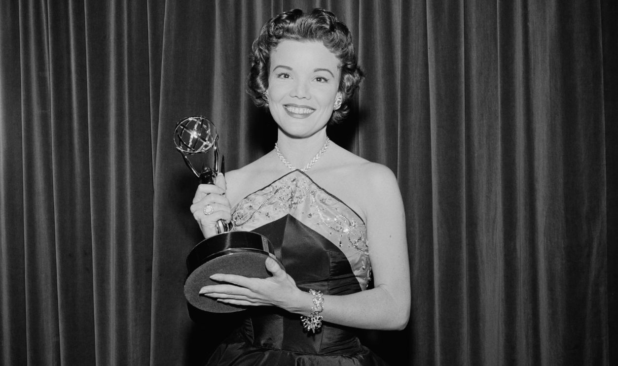 American actress, singer and dancer Nanette Fabray (1920 - 2018) wins the Best Supporting Actress award at the 8th Primetime Emmy Awards in Hollywood, California, for various roles in the television show 'Caesar's Hour', 17th March 1956.