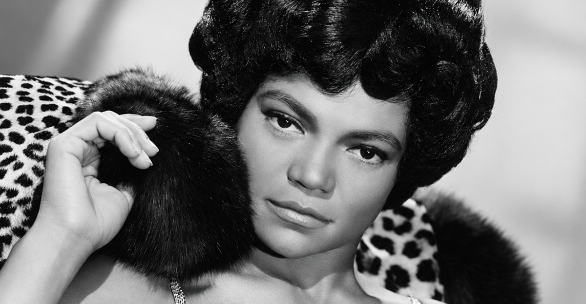 American singer and actress Eartha Kitt decked in leopard skin and furs for her London stage show 'Talk of the Town', 9th September 1960
