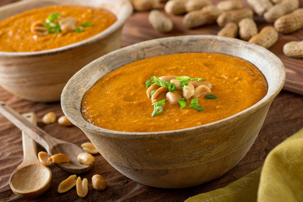 peanut soup with green onion garnish