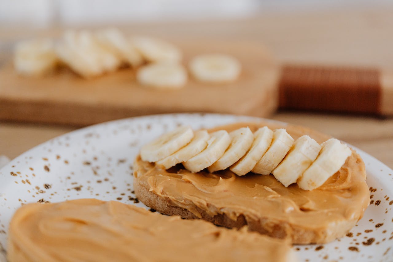 Close Up Photo of Sliced Banana on a Toast wit peanut butter