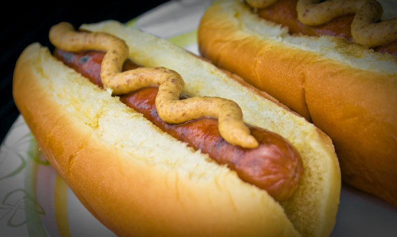 Close-up Photo of two Hot Dogs on a Bun