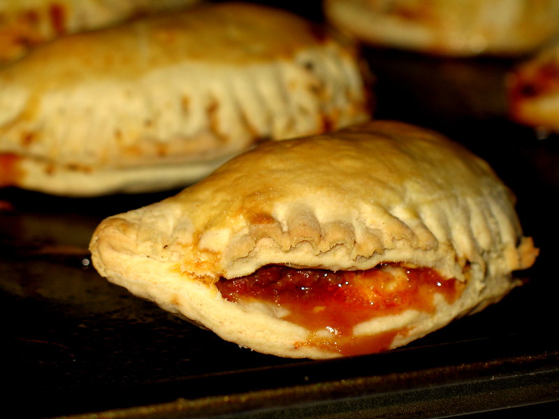 Close-up Photo of Empanadas on a wooden table
