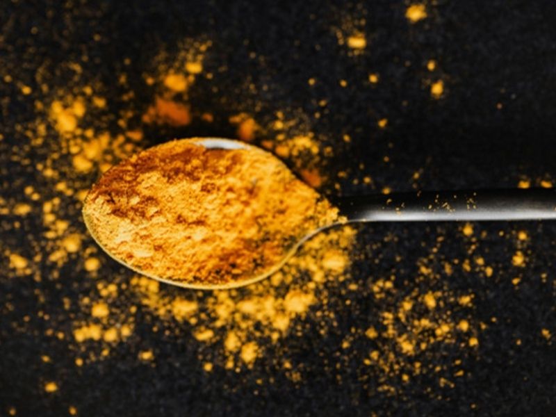 Tumeric Powder on spoon