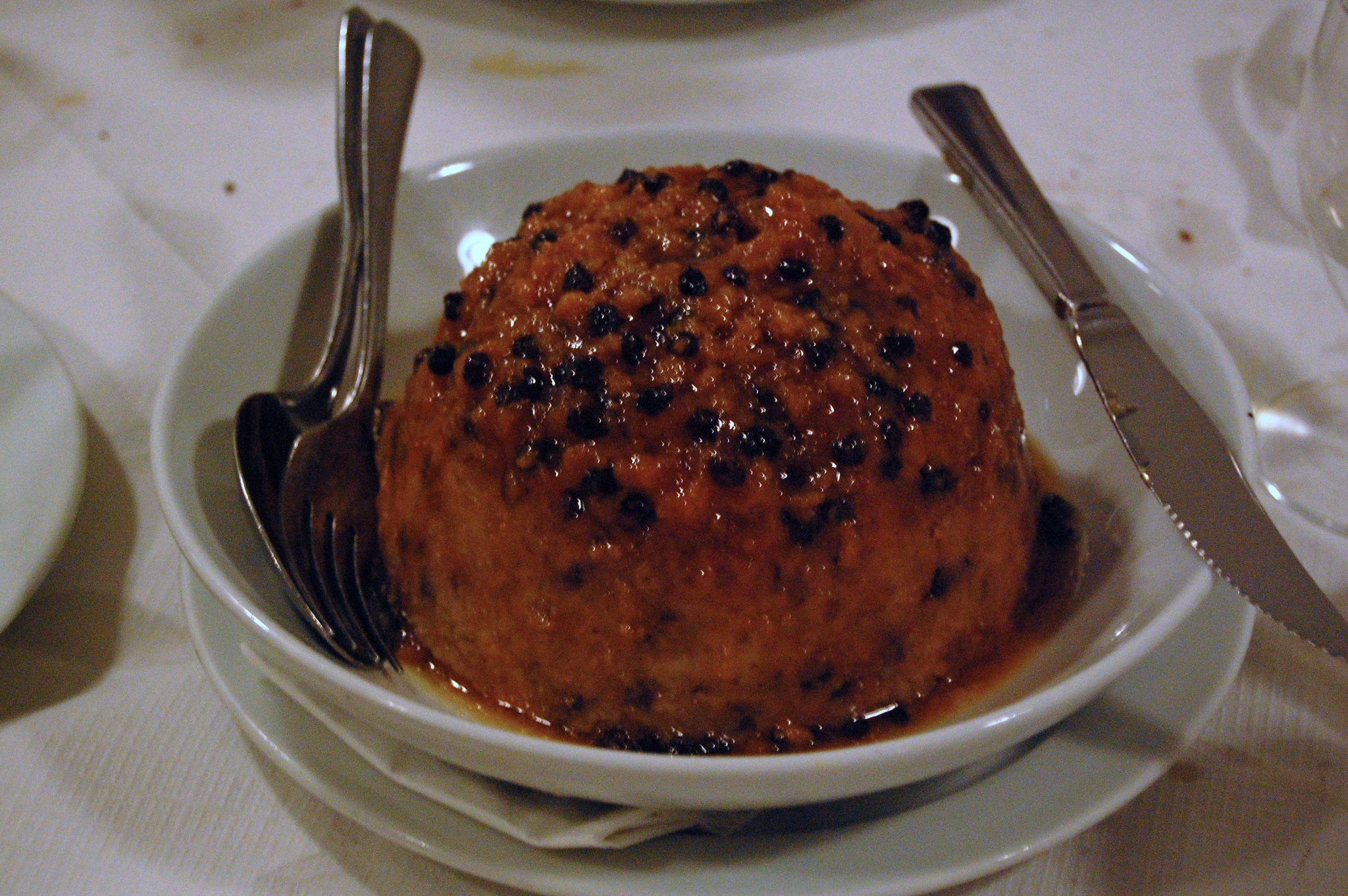 Spotted Dick on a plate.