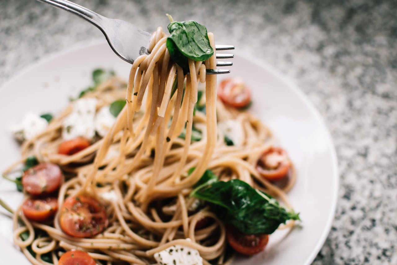 Photography of Pasta With Tomato and Basil