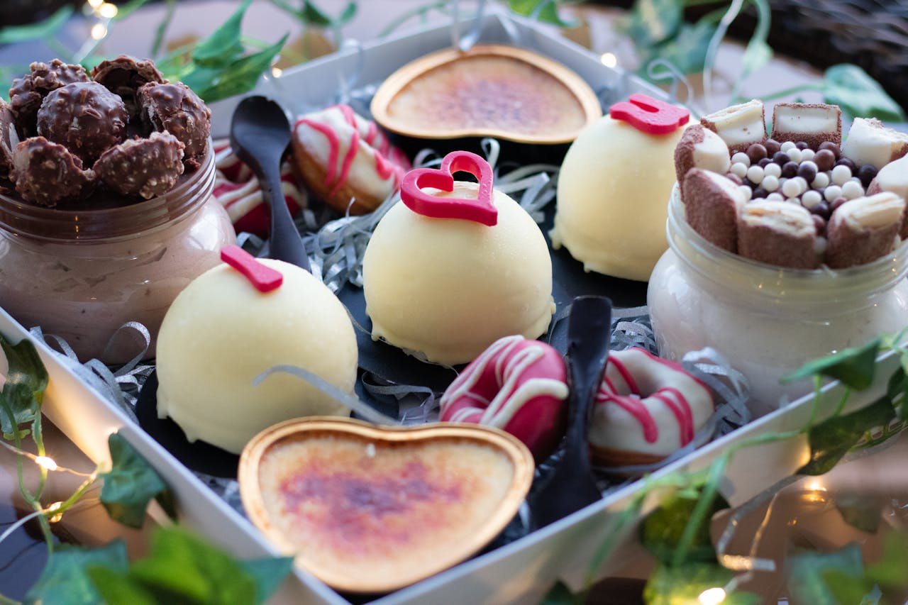 Set of delicious sweet deserts in box