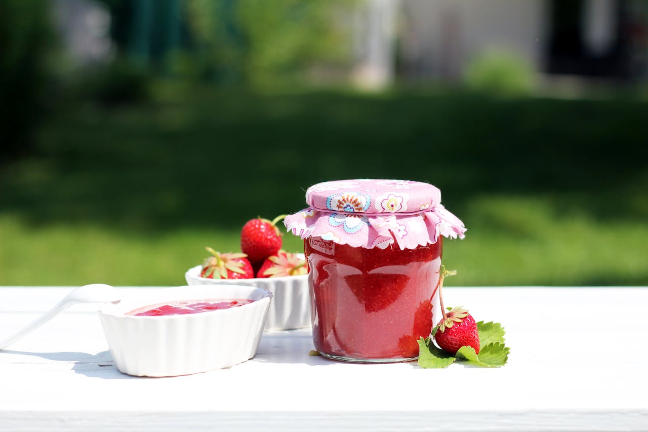 A Glass Jar with Strawberry Jam