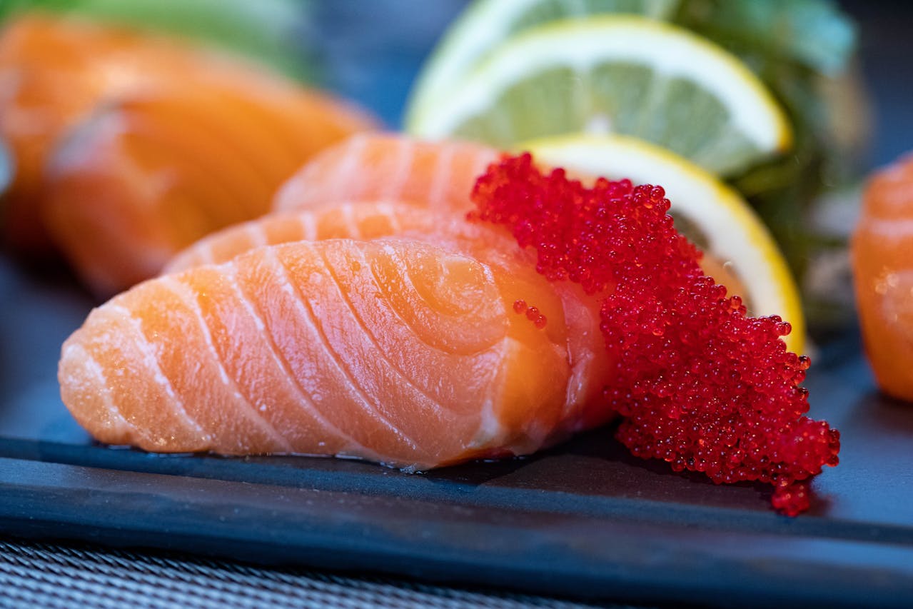 Close-Up Photo of Sliced Salmon with caviar