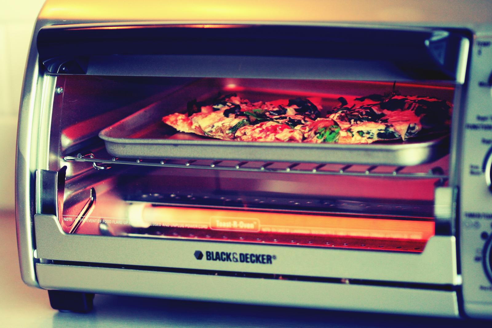 Reheating Pizza leftovers in toaster oven.