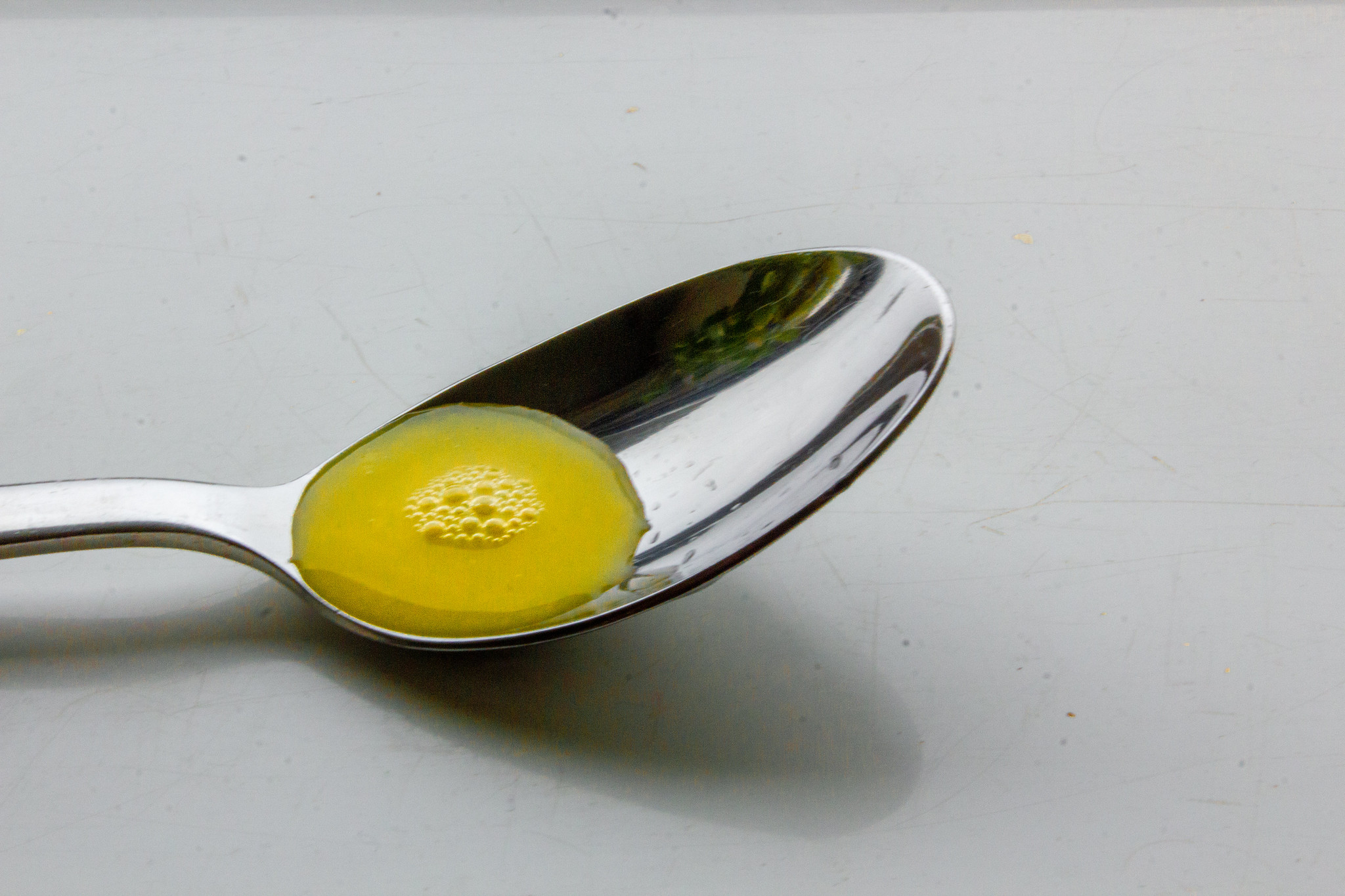 Tablespoon with orange juice