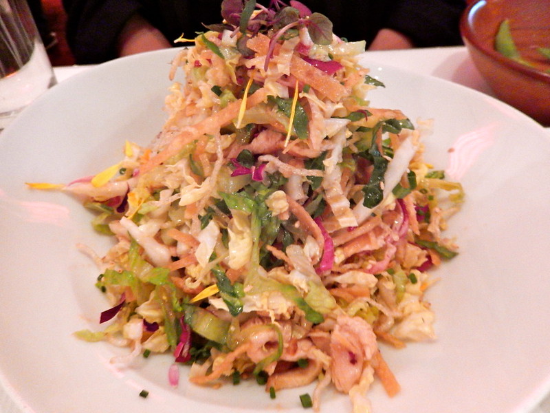 Close-up Photo of Cchinese Chicken salad on a white bowl