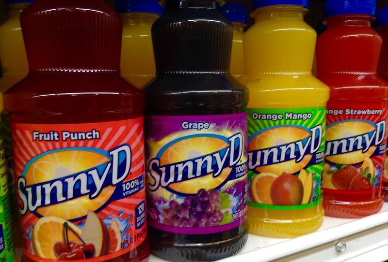 Close-up Photo of Sunny D, Delight Drink on a market rack