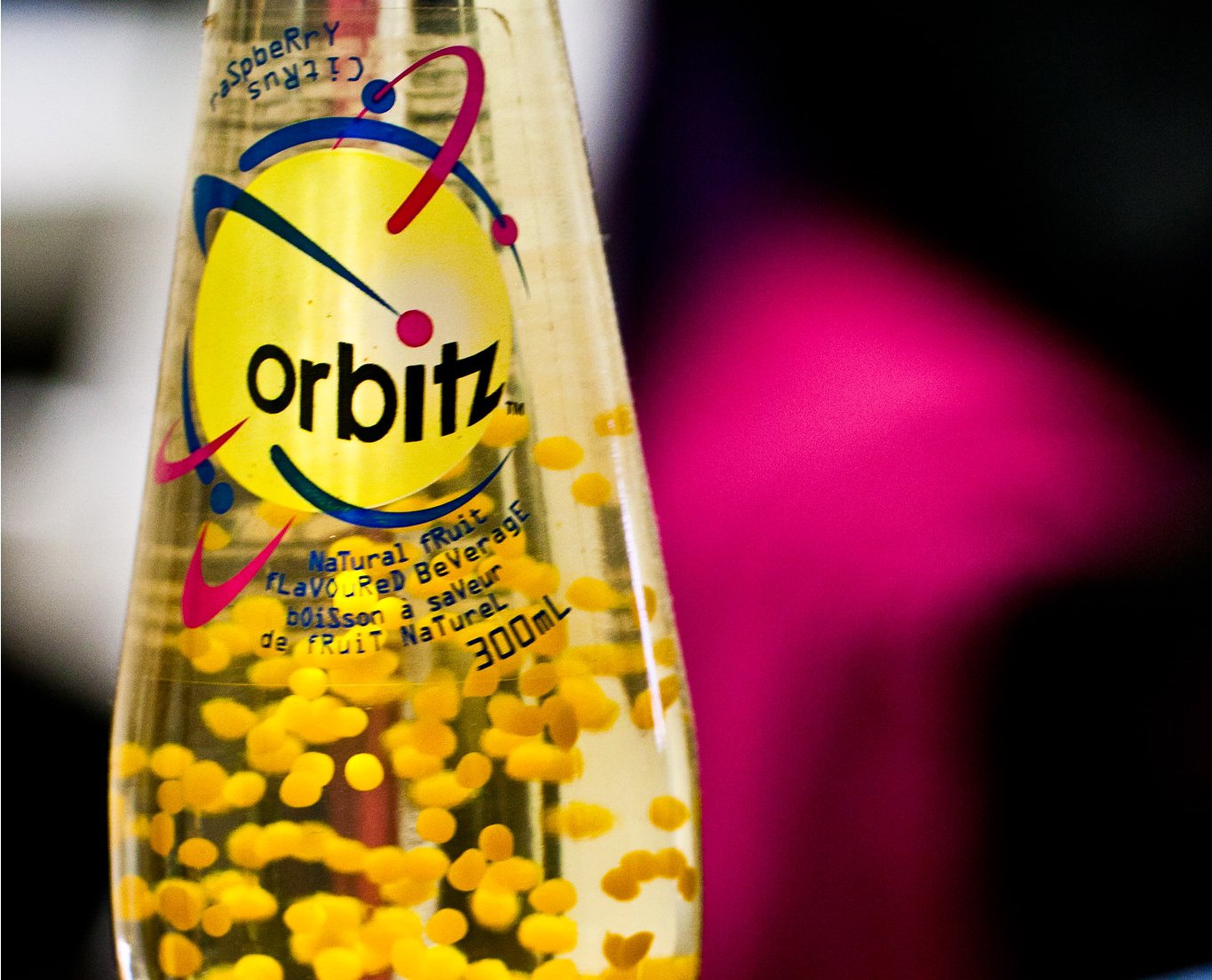 Close-up Photo of Orbitz bottle on a blurred background