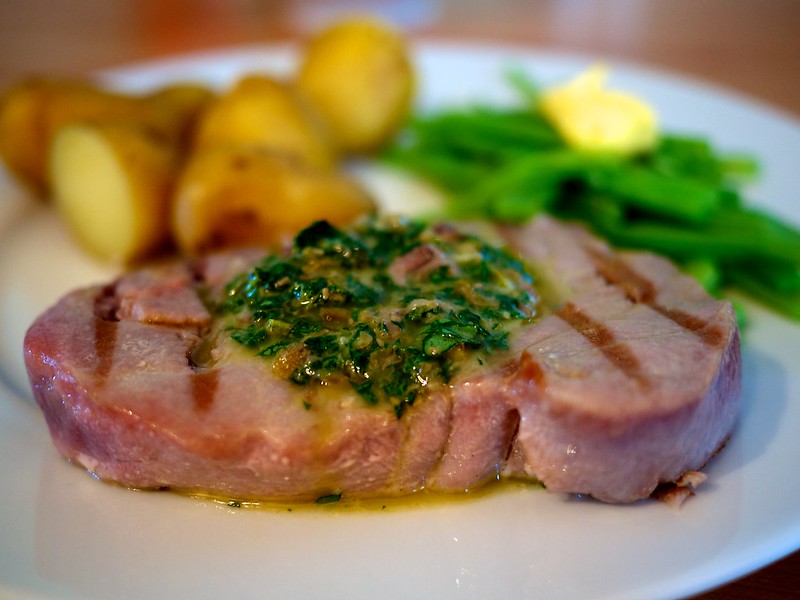 Seared tuna steak with salsa verde and steamed Jersey Royal new potatoes and runner beans