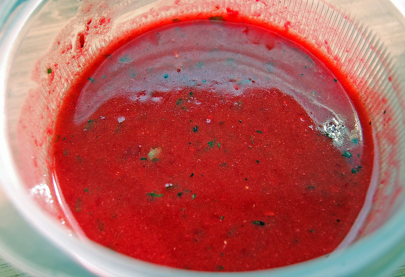 Close-up Photo of of Raspberry Vinaigrette in a clear cup