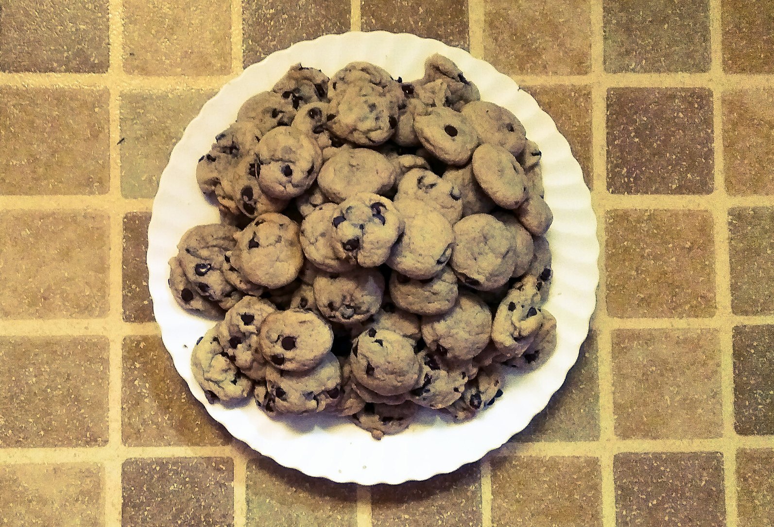 Overhead Photo of Mini chocolate chip cookies on a white plate