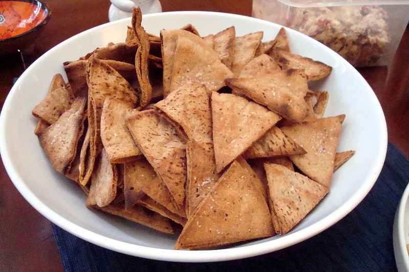 Close-up Photo of Whole Wheat Pita Chips on a white bowl