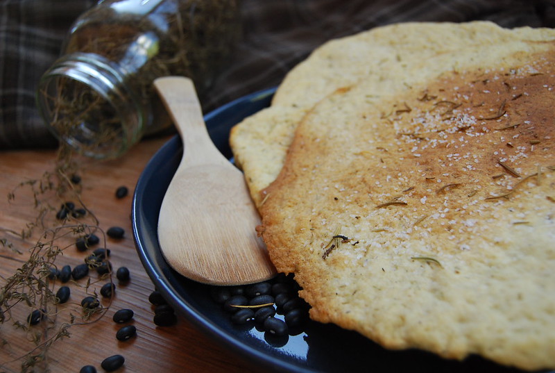 Close-up Photo of Smitten Kitchen's Rosemary Flatbread on a black plate