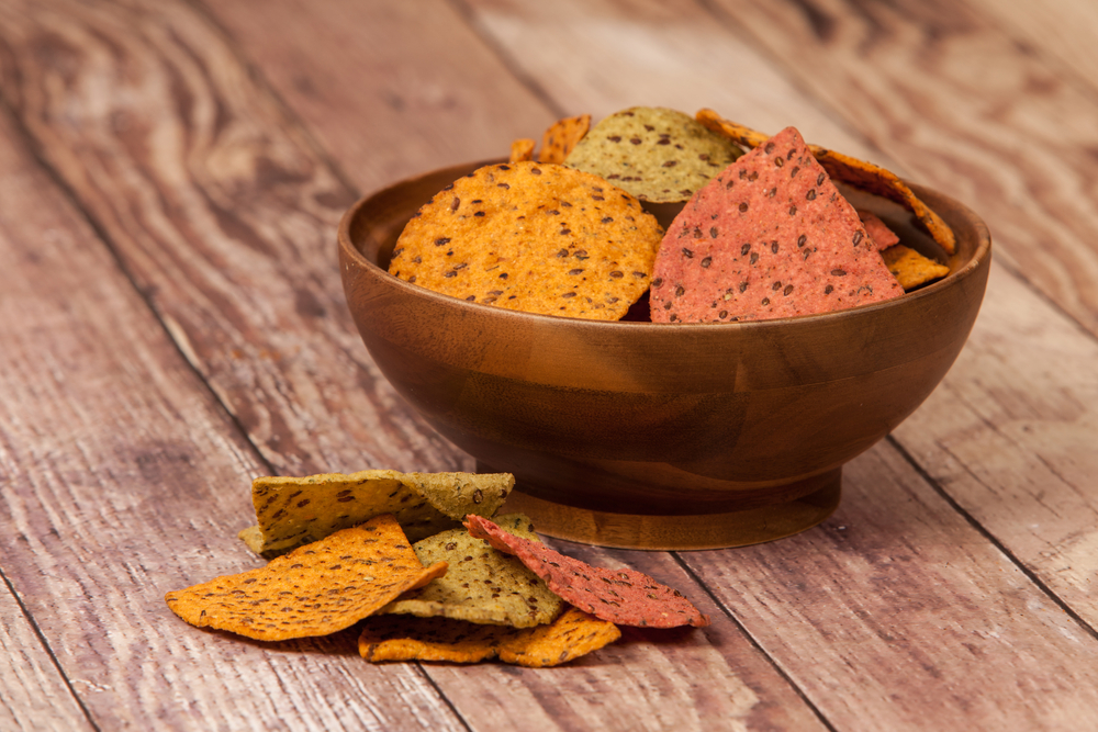 Multi Grain Flax Seed Tortilla Chips In A Wooden Bowl