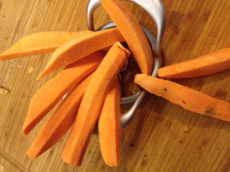 Overhead Photo of Steak cut sweet potato fries with apple slicer