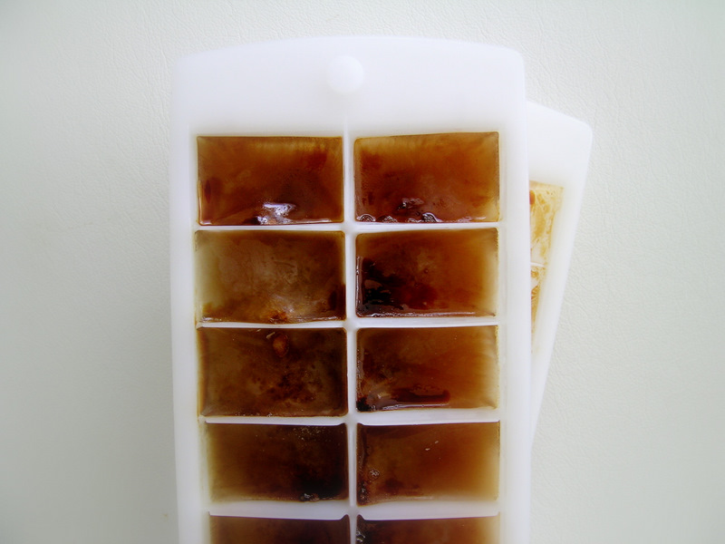 Overhead Photo of Coffee Ice Cubes in ice cube tray.