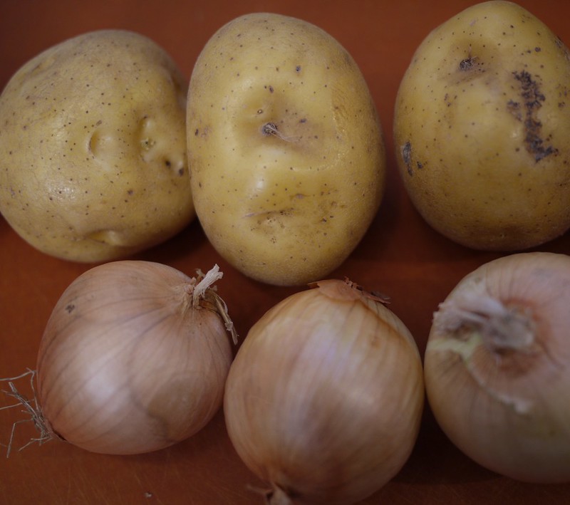 Close Up Photo of Potatoes and onions