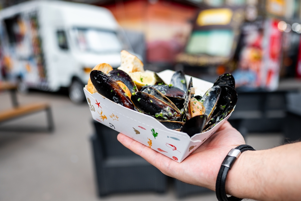 paper container filled with mussels