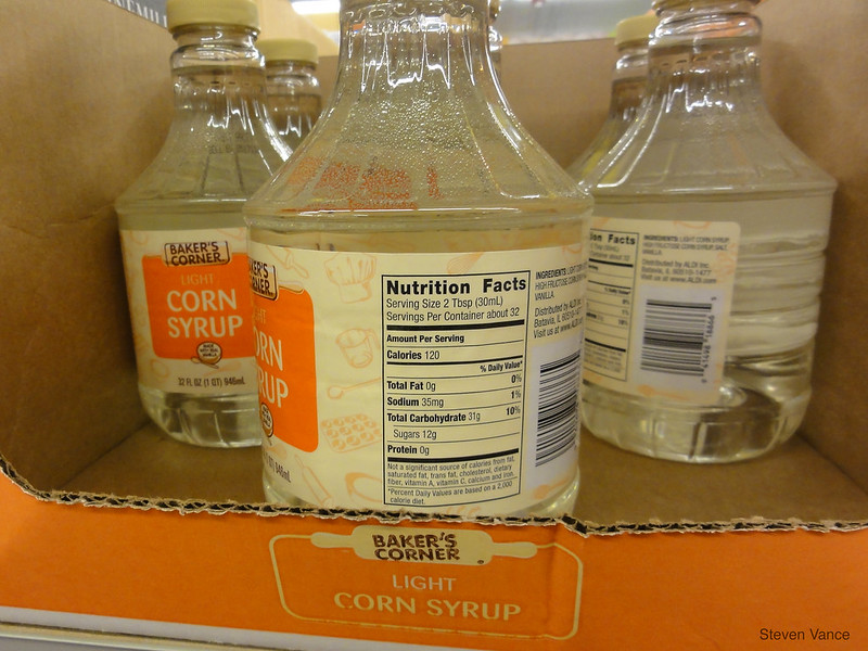 Close Up Photo of Bottles with High-fructose corn syrup for sale