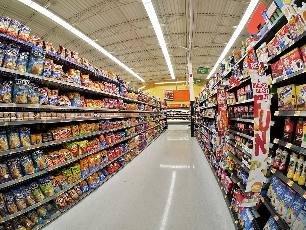 Photo of Potato chips and other junk food on a Market racks