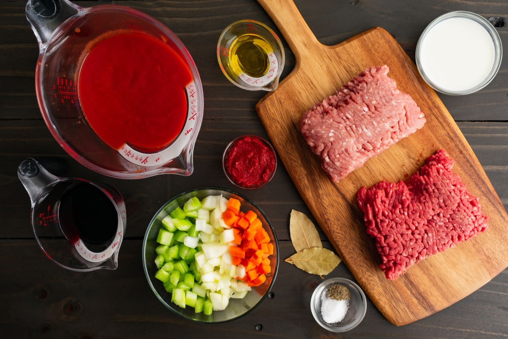 Chopped vegetables, measured passata and beef meat.