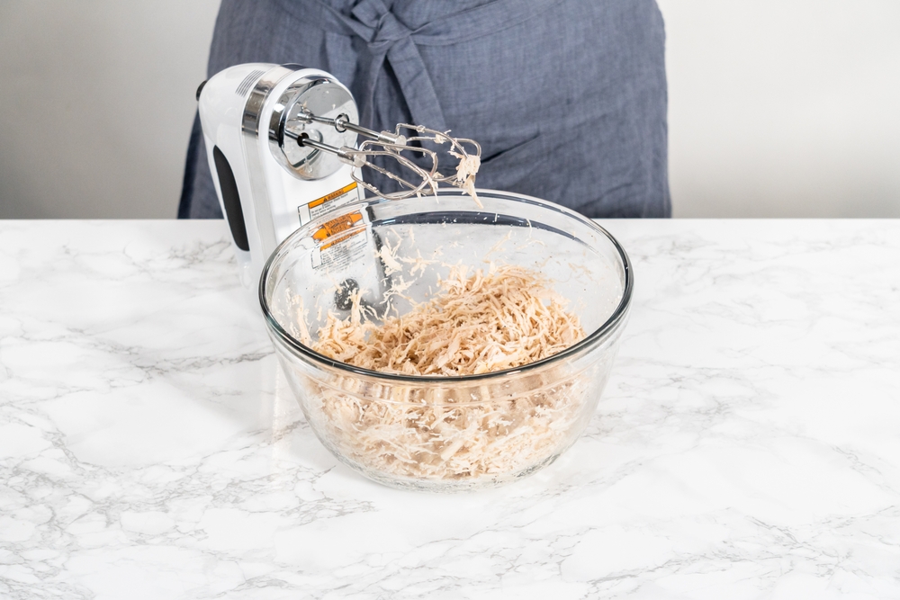 Shredding freshly cooked chicken