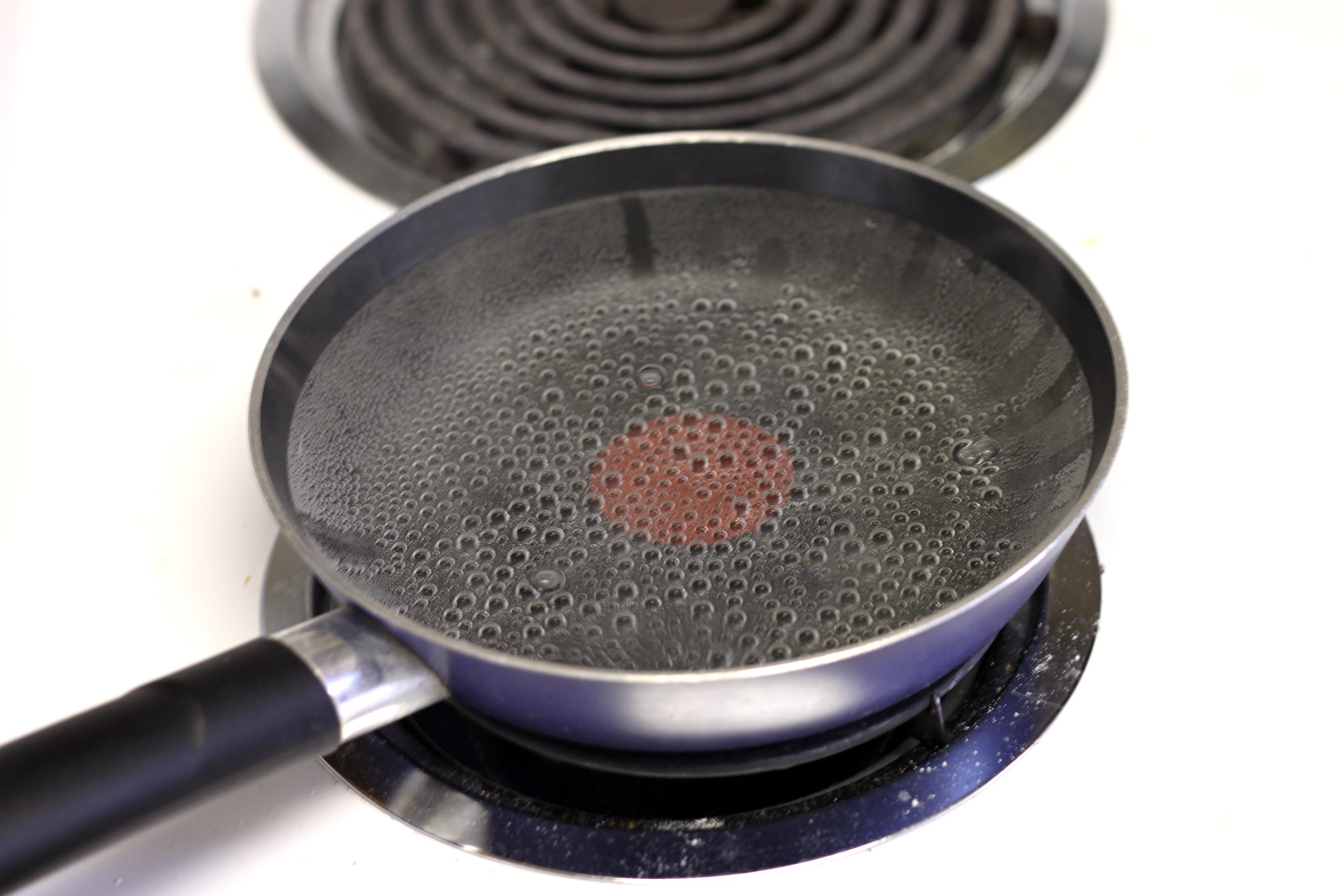 Simmering water in pan