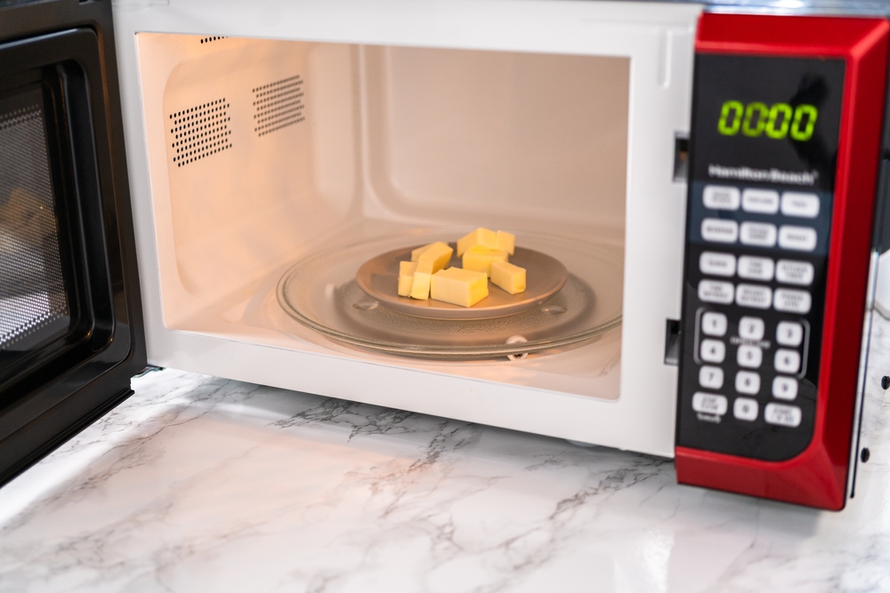 Softened sticks of unsalted butter on in the microwave.