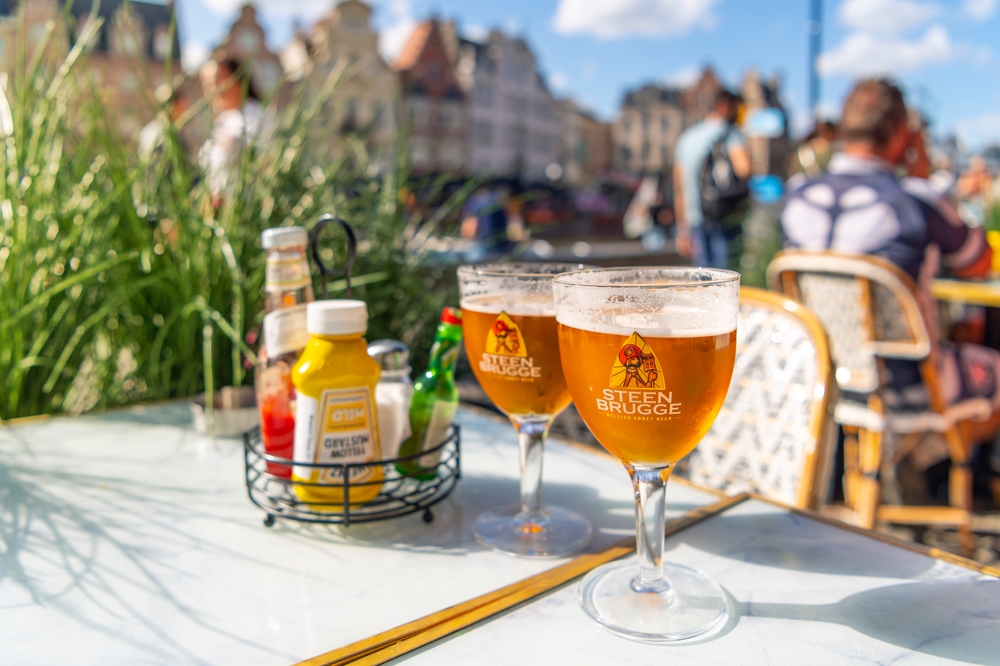 Table view of two pint glasses of Steen Brugge Belgian Abbey Beer